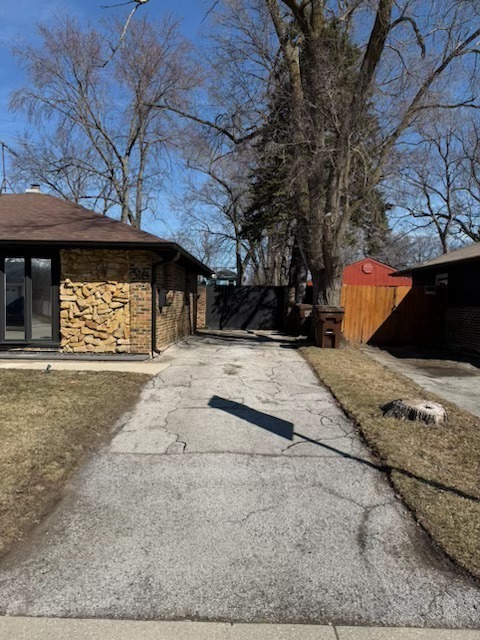 316 Mohawk Street Park Forest, IL 60466 - Photo 3 of 26 a view of outdoor space yard and garage