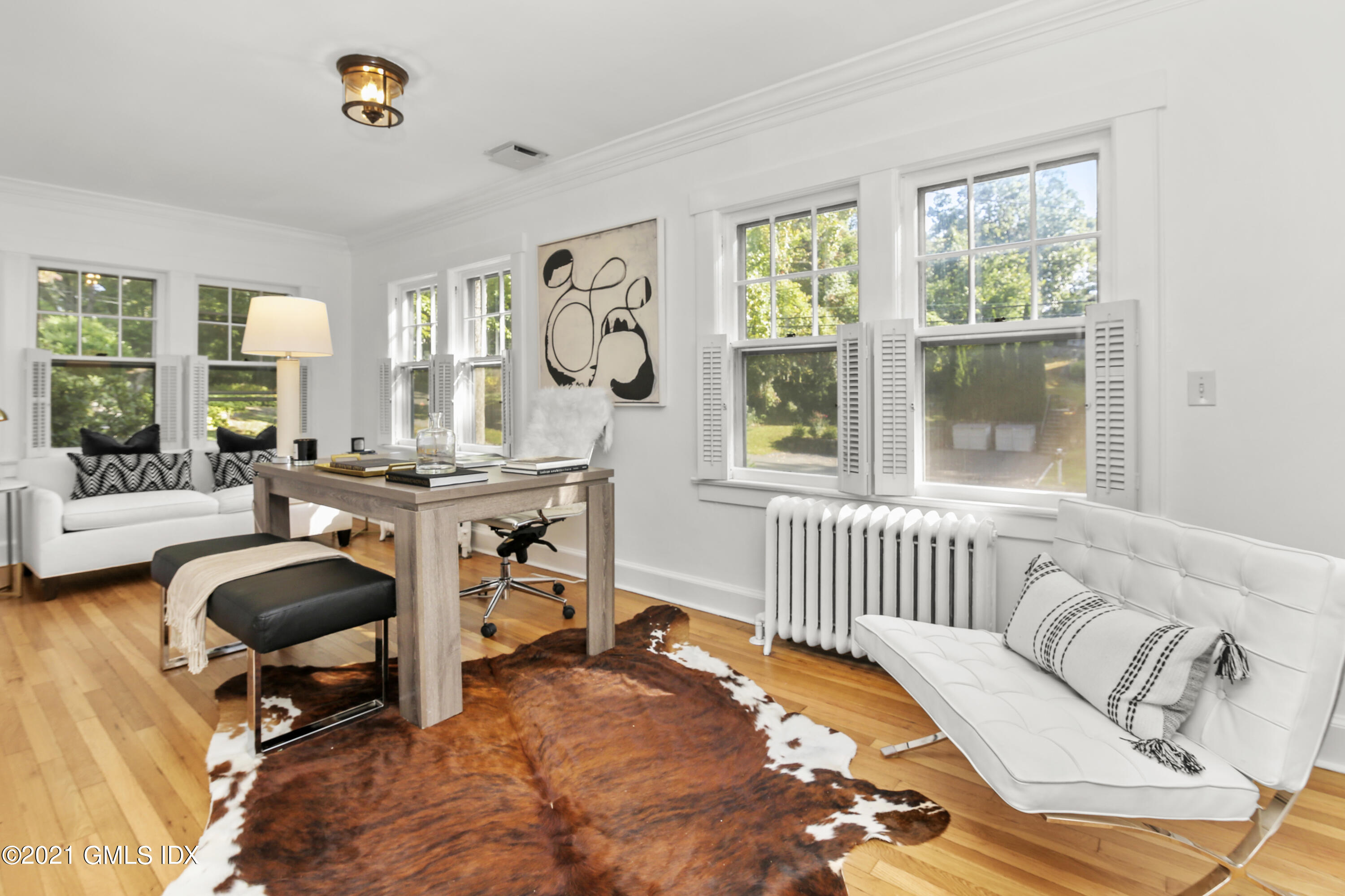 41 Butler Street Cos Cob, CT 06807 - Photo 13 of 33 a view of a livingroom with furniture and a floor to ceiling window