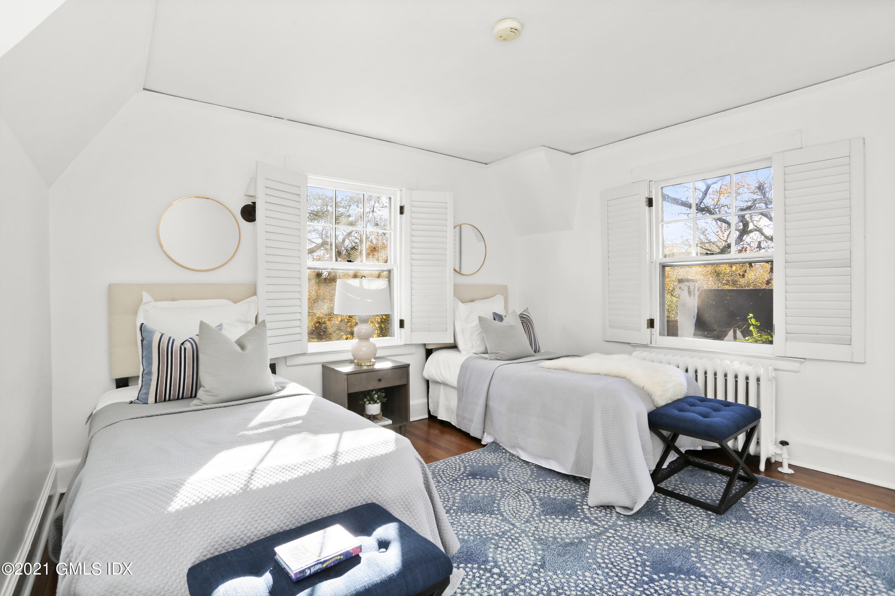 41 Butler Street Cos Cob, CT 06807 - Photo 21 of 33 a bedroom with two beds and a window