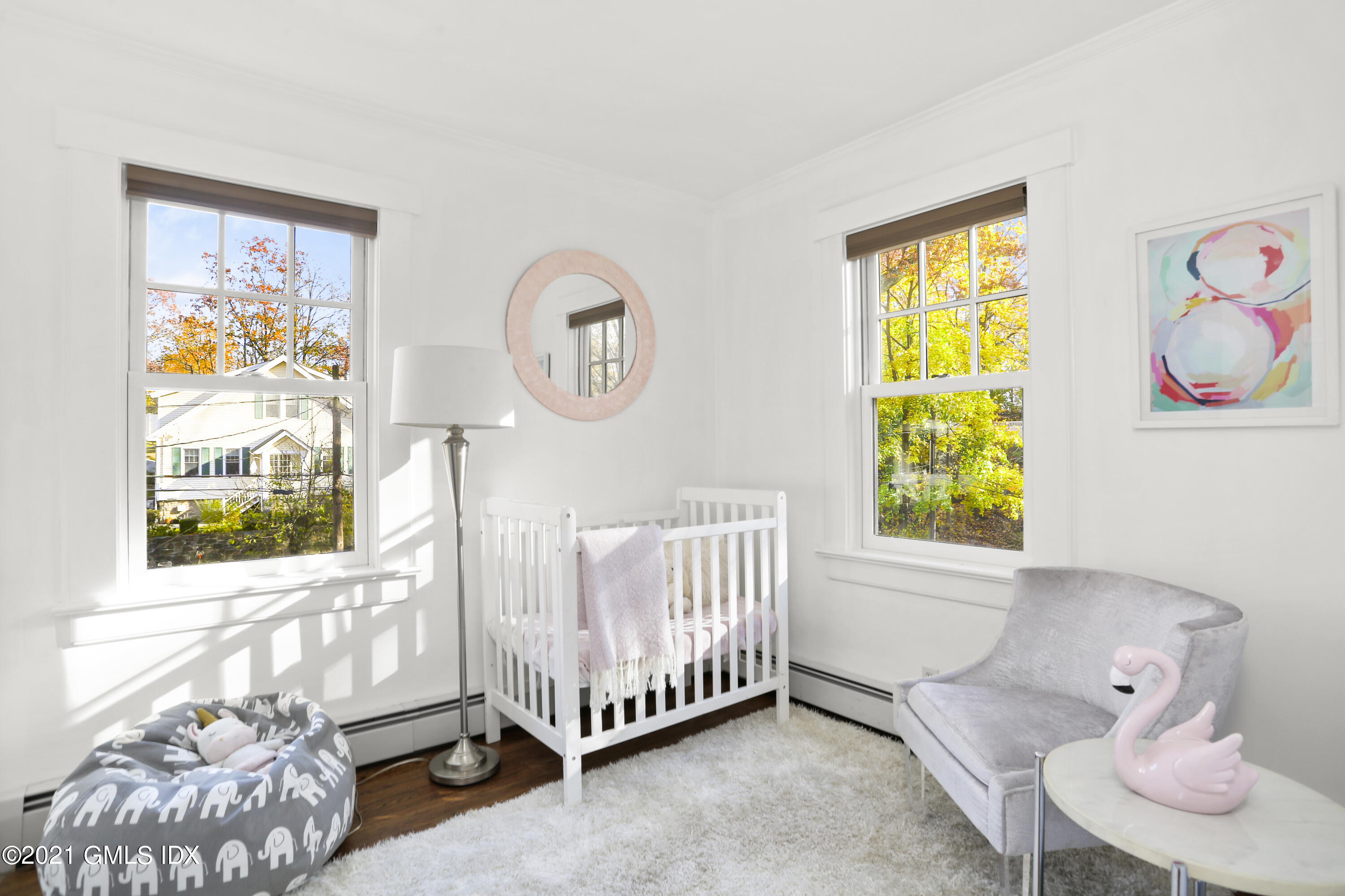 41 Butler Street Cos Cob, CT 06807 - Photo 23 of 33 a living room with furniture and a window