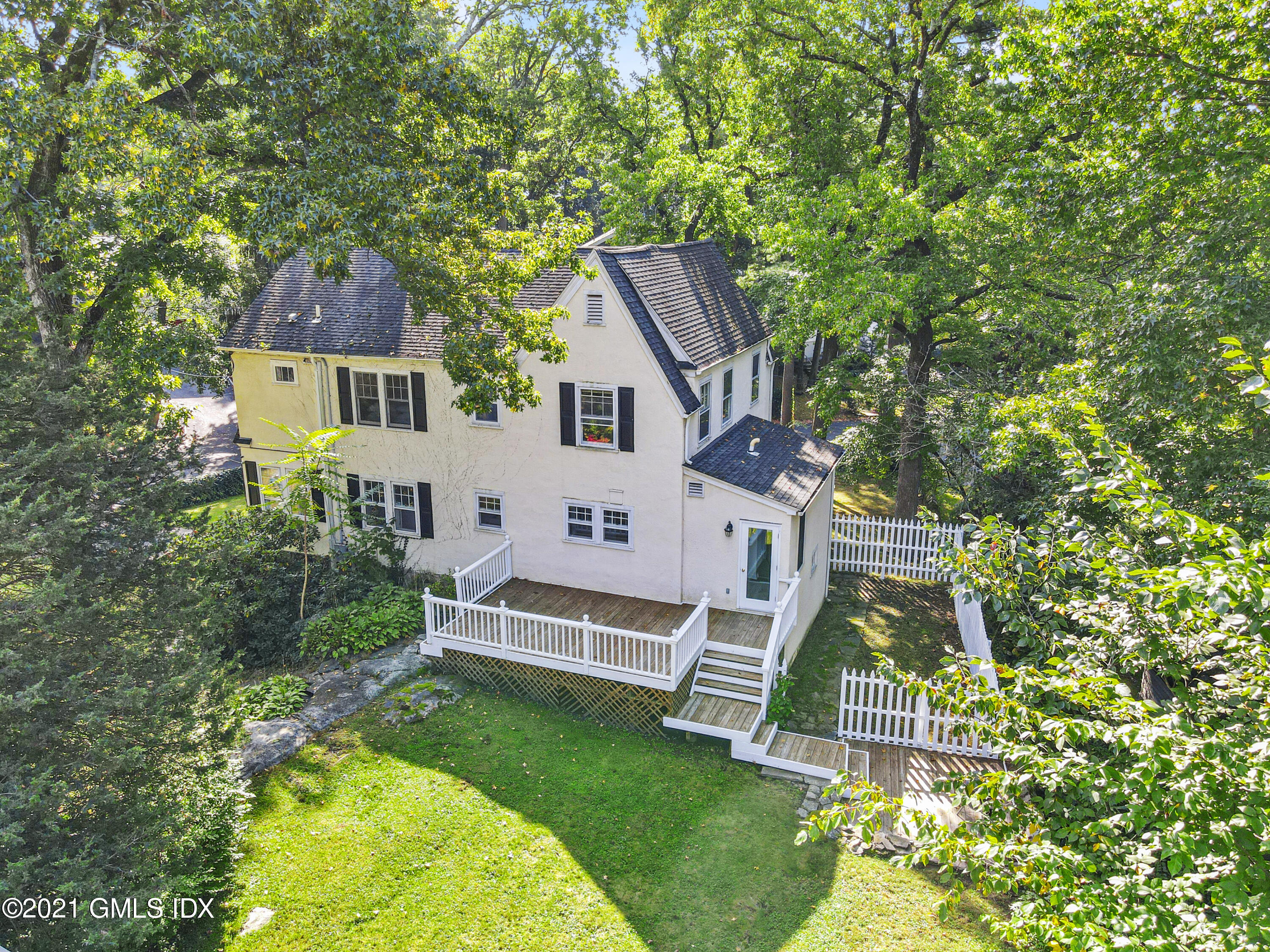 41 Butler Street Cos Cob, CT 06807 - Photo 3 of 33 front view of house with a yard