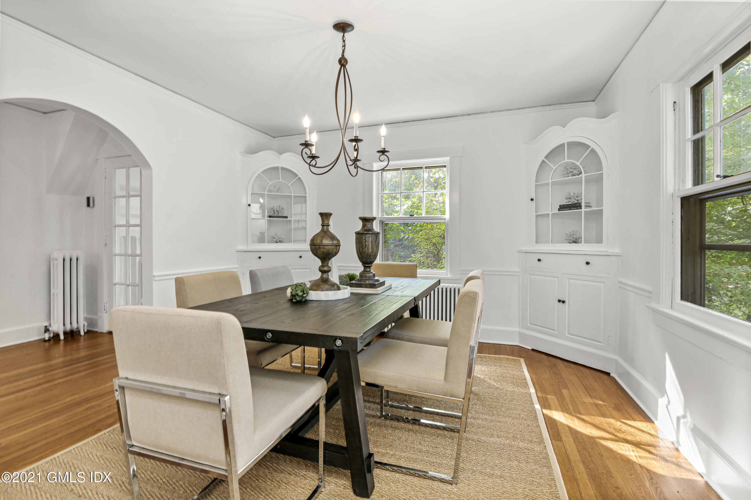 41 Butler Street Cos Cob, CT 06807 - Photo 9 of 33 a view of a dining room with furniture window and wooden floor