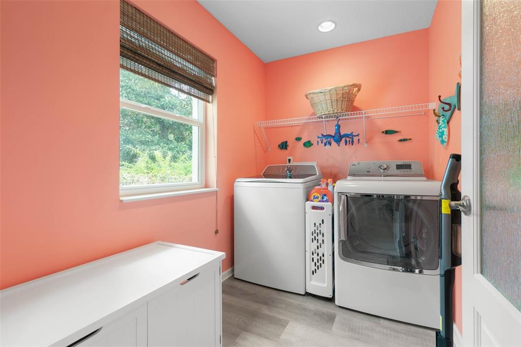 47 Sandy Beach Way Palm Coast, FL 32137 - Photo 46 of 70 a utility room with dryer and washer