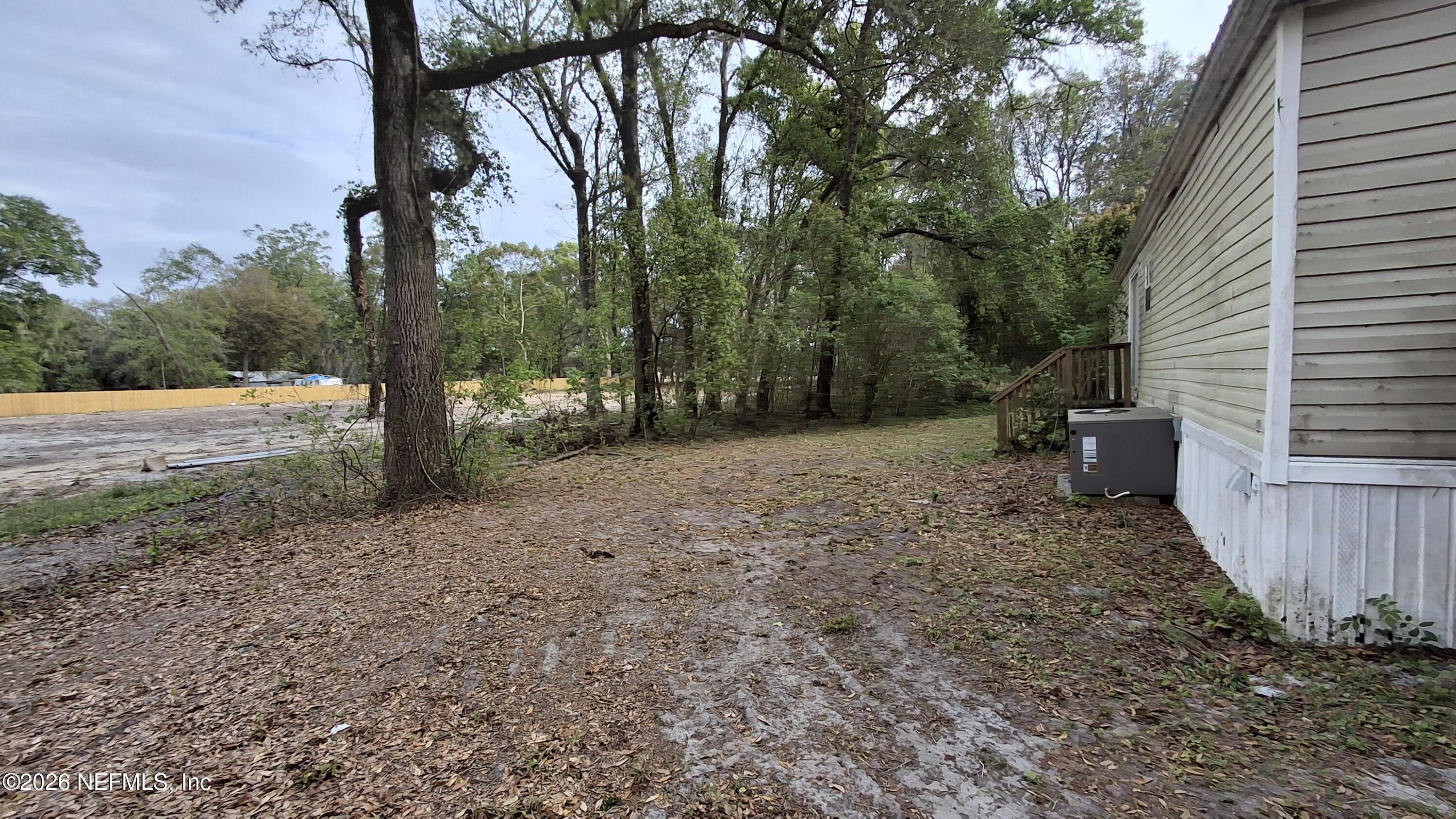 6097 Taylor Road Jacksonville, FL 32234 - Photo 12 of 15 Behind the home