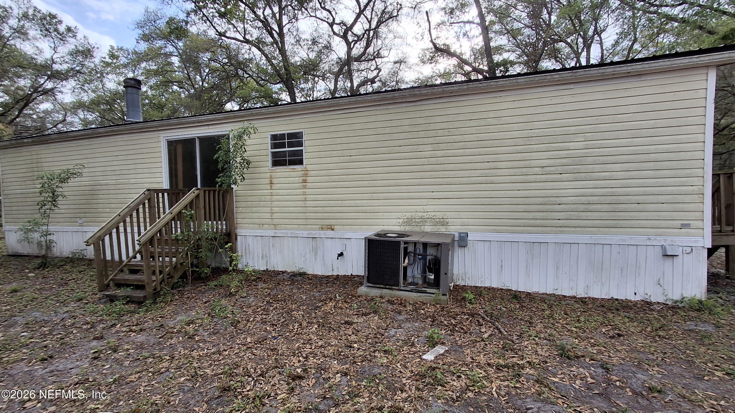 6097 Taylor Road Jacksonville, FL 32234 - Photo 13 of 15 Rear of home