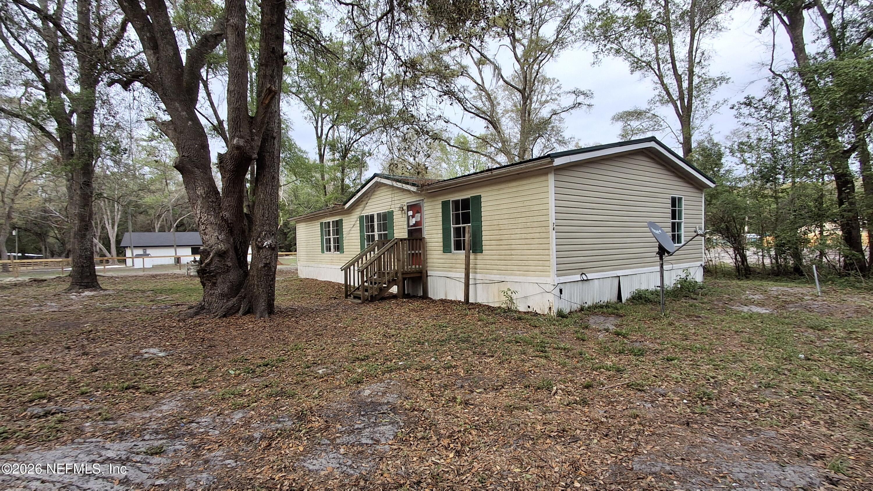 6097 Taylor Road Jacksonville, FL 32234 - Photo 15 of 15 Right view of home