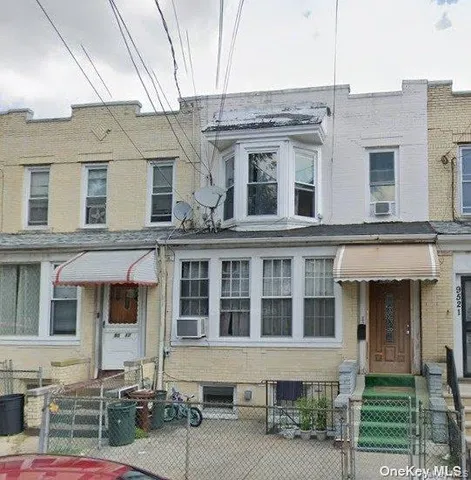 front view of a building with a street