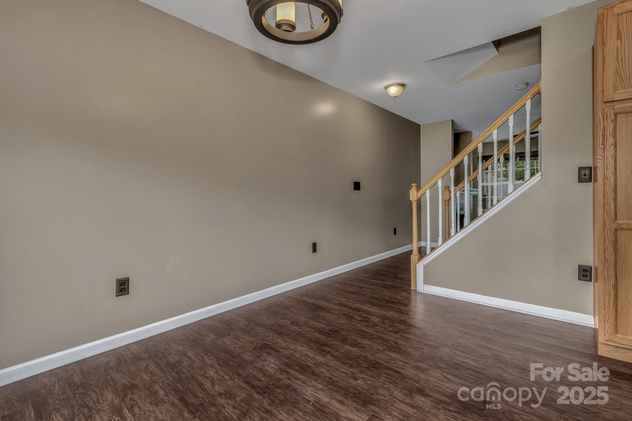 4 Lilac Fields Way Arden, NC 28704 - Photo 18 of 33 a view of an entryway with wooden floor