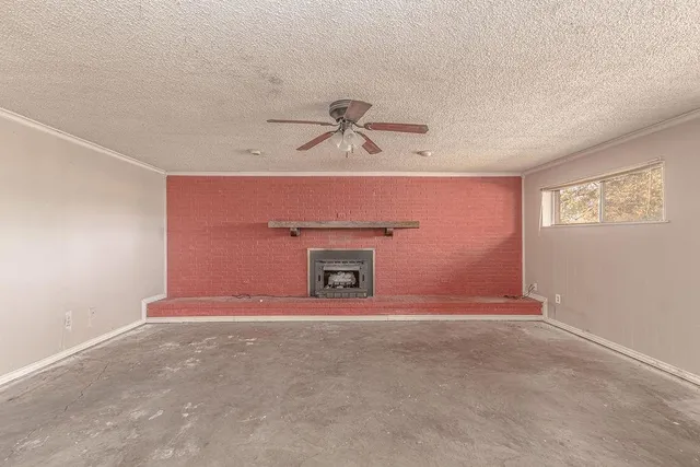 a spacious bathroom with a granite countertop sink mirror and a