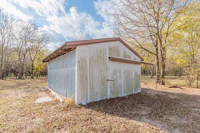 a view of backyard of house