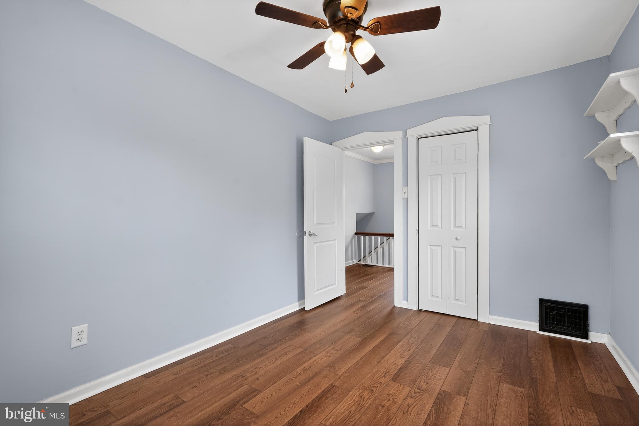 106 Ford Street Voorhees, NJ 08043 - Photo 19 of 36 a view of a room with wooden floor and a ceiling fan