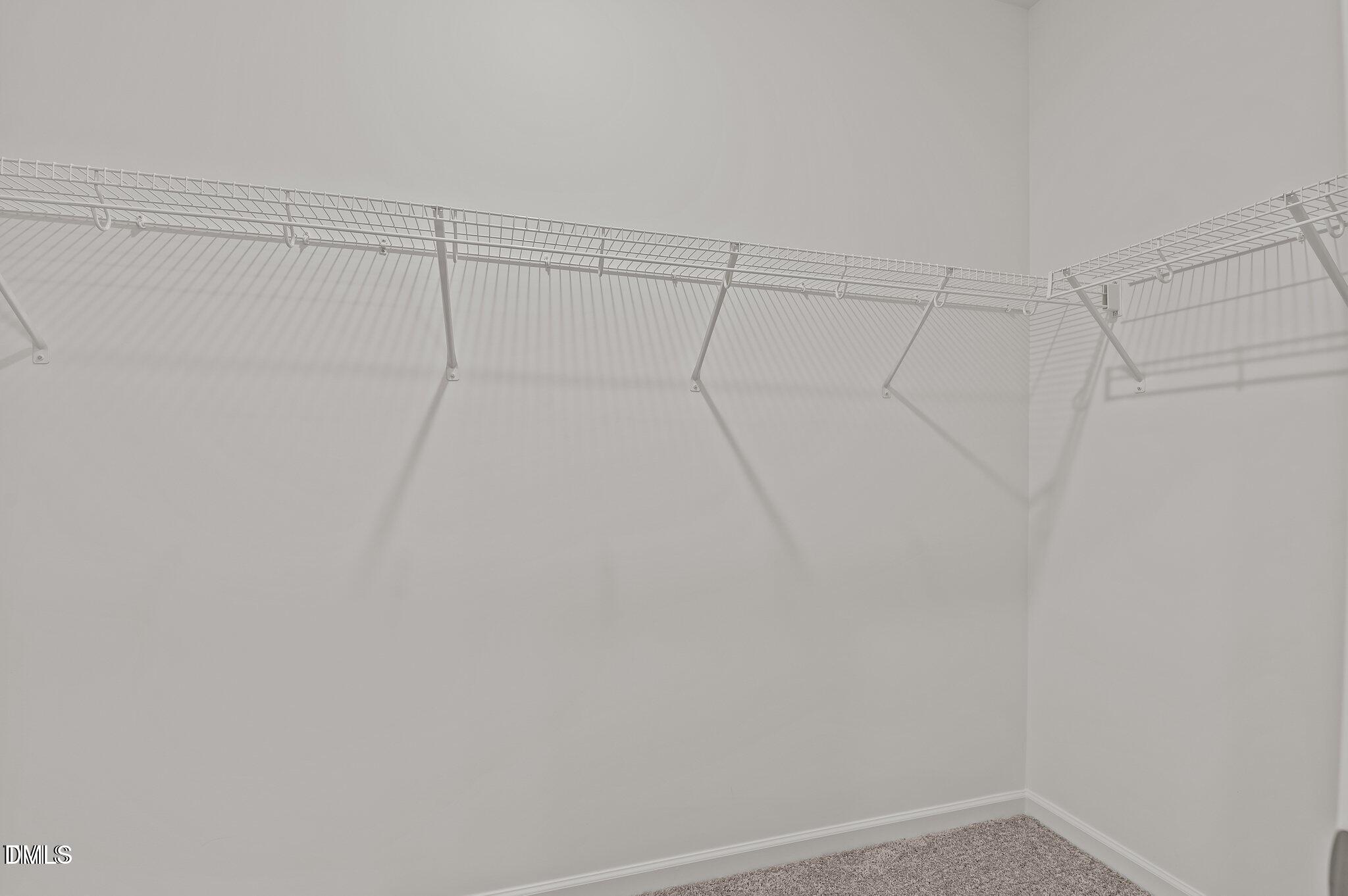 646 Essex Road Nashville, NC 27856 - Photo 12 of 24 a view of a room with racks on the wall