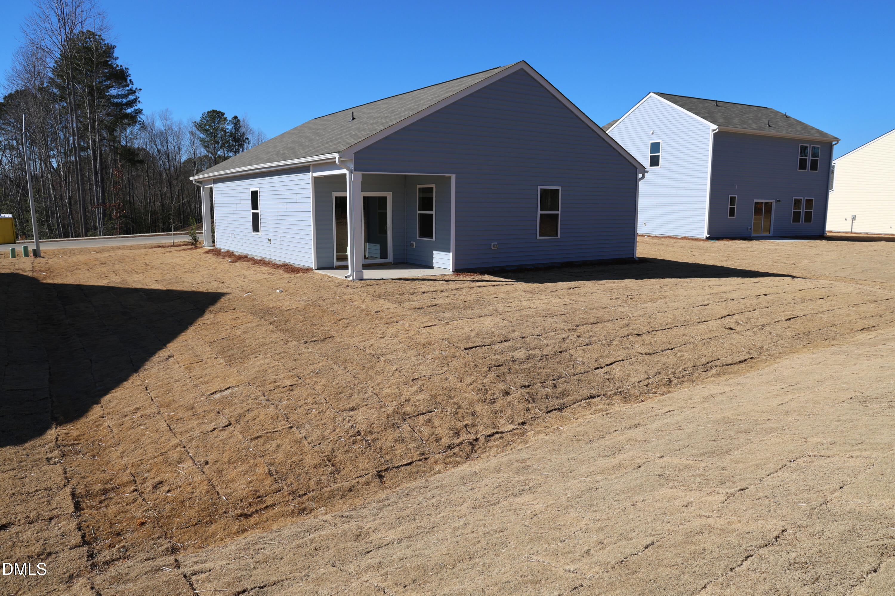 646 Essex Road Nashville, NC 27856 - Photo 19 of 24 a front view of a house with a yard