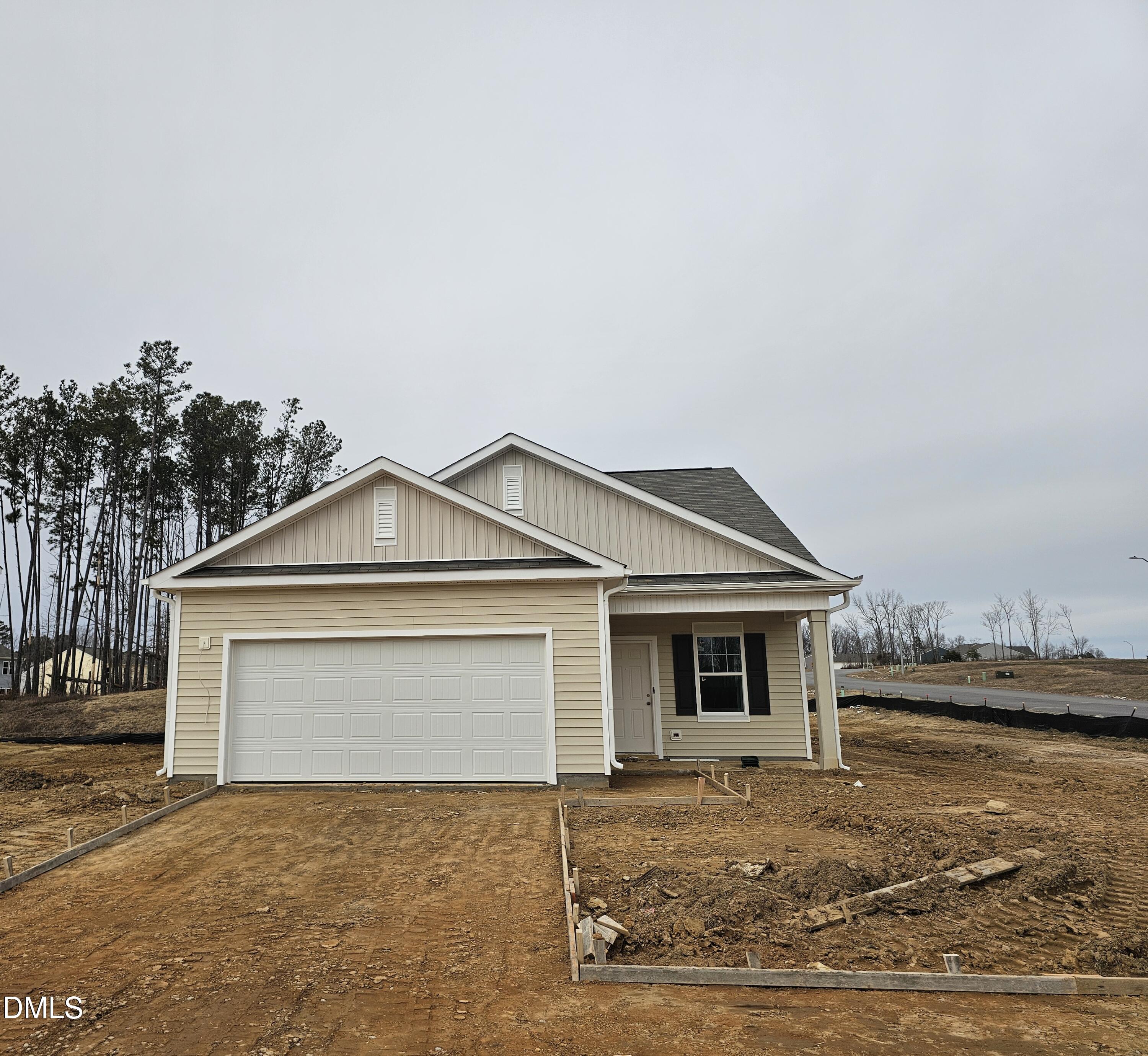646 Essex Road Nashville, NC 27856 - Photo 24 of 24 a front view of a house with a yard