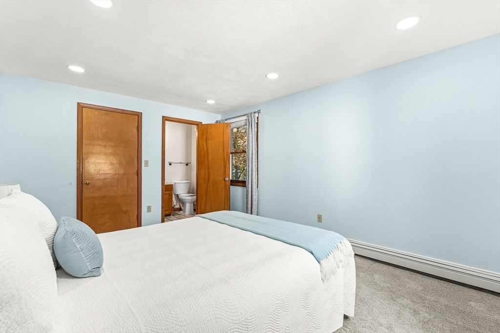 25 Murdoch Road Stoneham, MA 02180 - Photo 17 of 39 a bedroom with a bed and a window