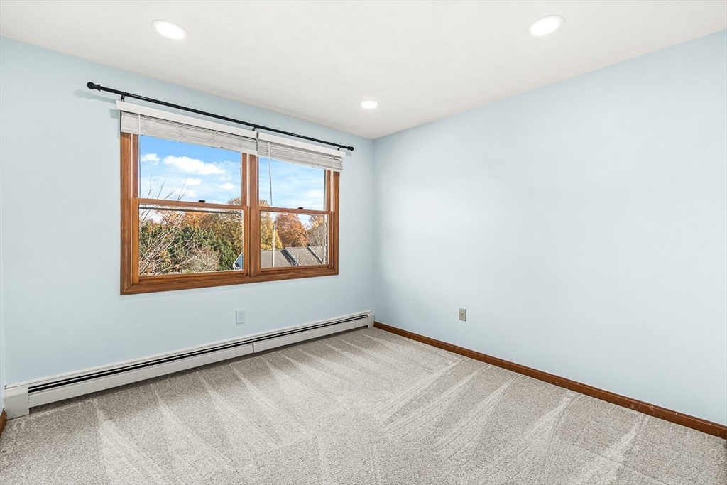 25 Murdoch Road Stoneham, MA 02180 - Photo 21 of 39 an empty room with window