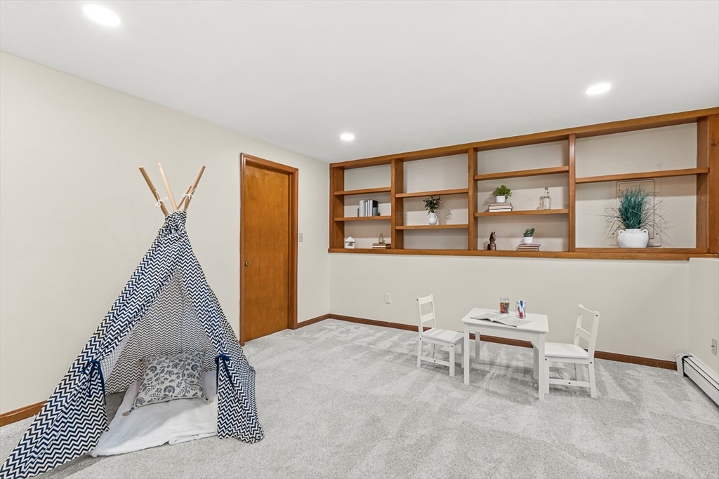 25 Murdoch Road Stoneham, MA 02180 - Photo 25 of 39 a living room with furniture