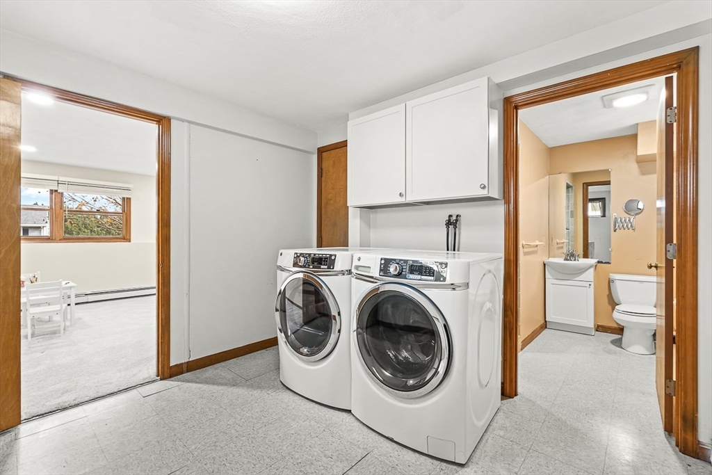 25 Murdoch Road Stoneham, MA 02180 - Photo 29 of 39 a view of a kitchen with washer and dryer