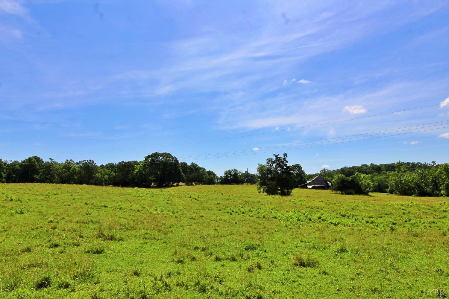 0 Storey Road Concord, VA 24538 - Photo 18 of 19 a view of grassy field with mountain in the background