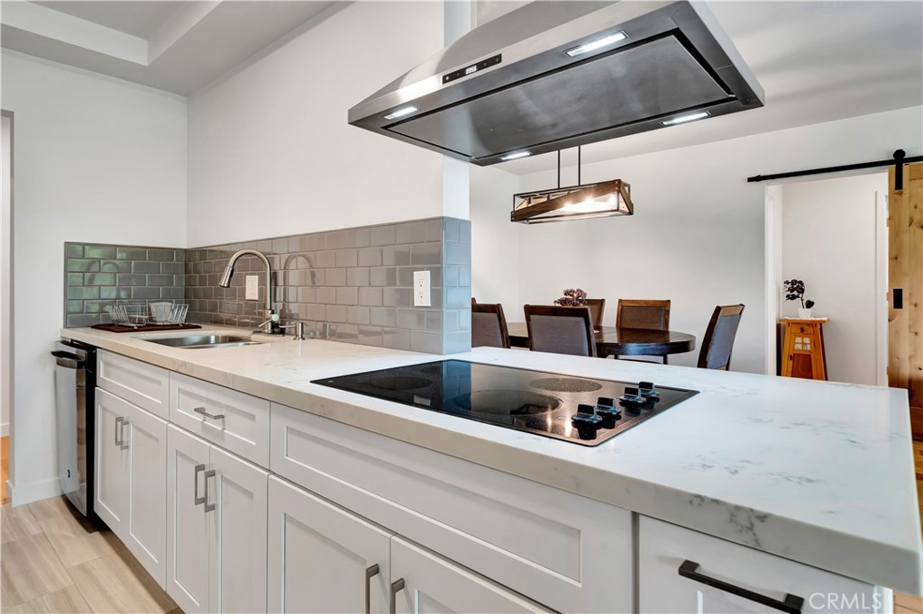 8710 Delgany Avenue, Unit 17 Playa del Rey, CA 90293 - Photo 12 of 36 a kitchen with a stove and a sink