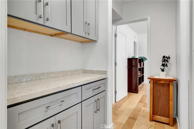 a hallway with washer and dryer
