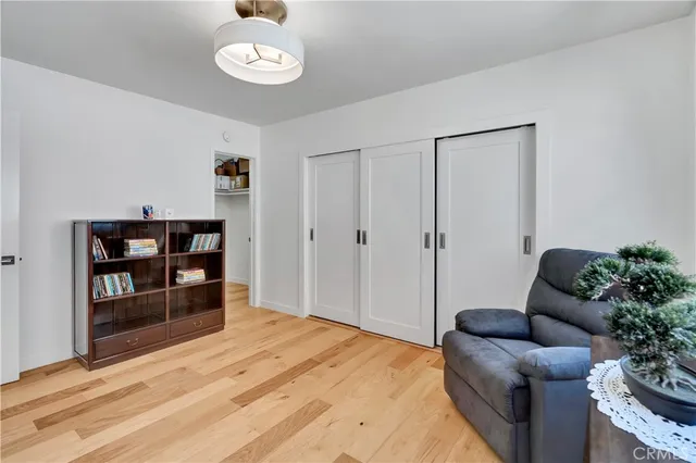 a view of livingroom with furniture and cabinet