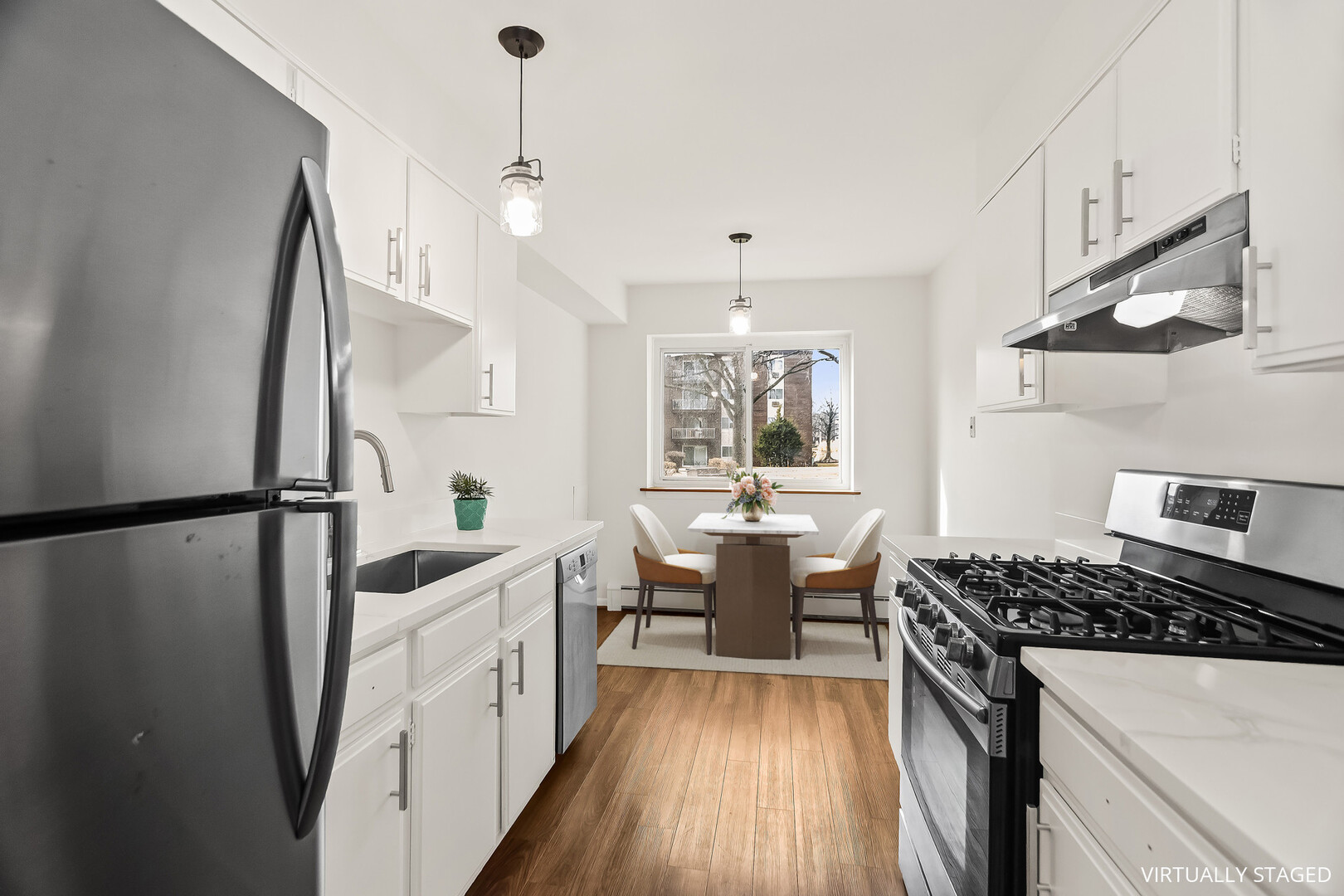 1331 South Finley Road, Unit 104 Lombard, IL 60148 - Photo 5 of 12 a kitchen with sink a stove and refrigerator