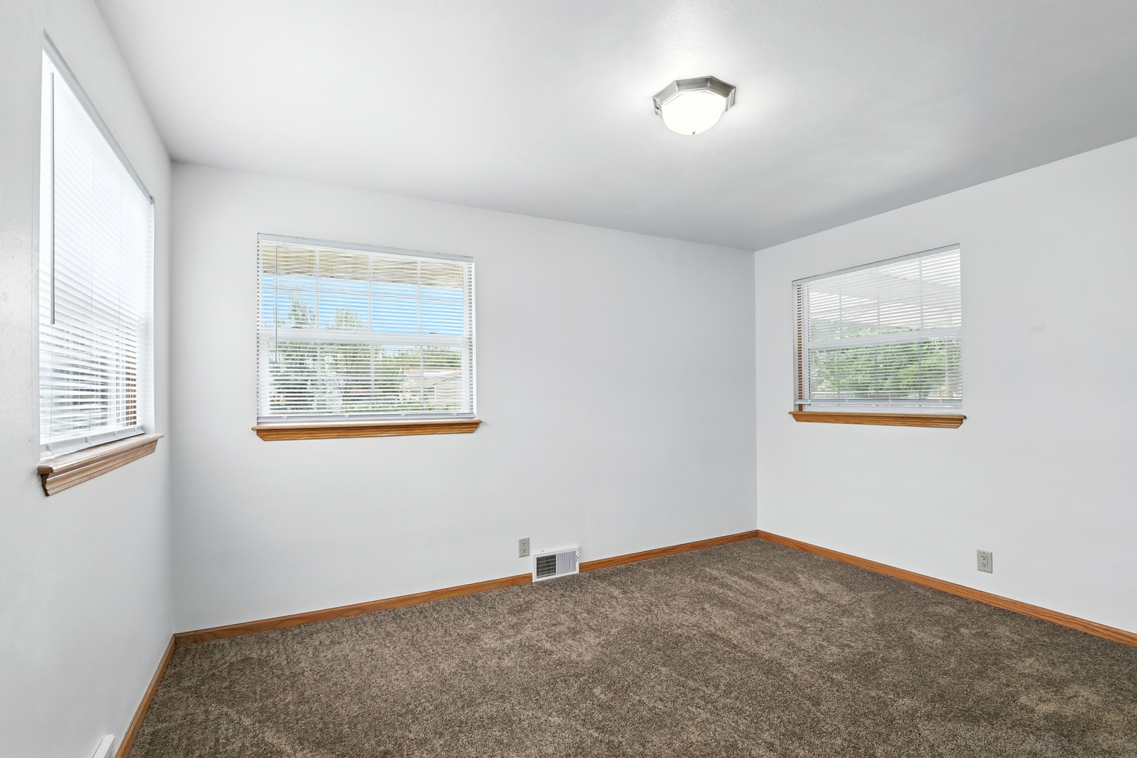 1401 20th Street Zion, IL 60099 - Photo 17 of 30 a view of an empty room with a window
