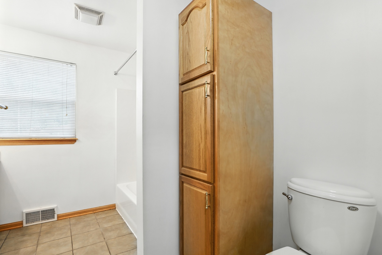1401 20th Street Zion, IL 60099 - Photo 22 of 30 a bathroom with a granite countertop toilet and a sink