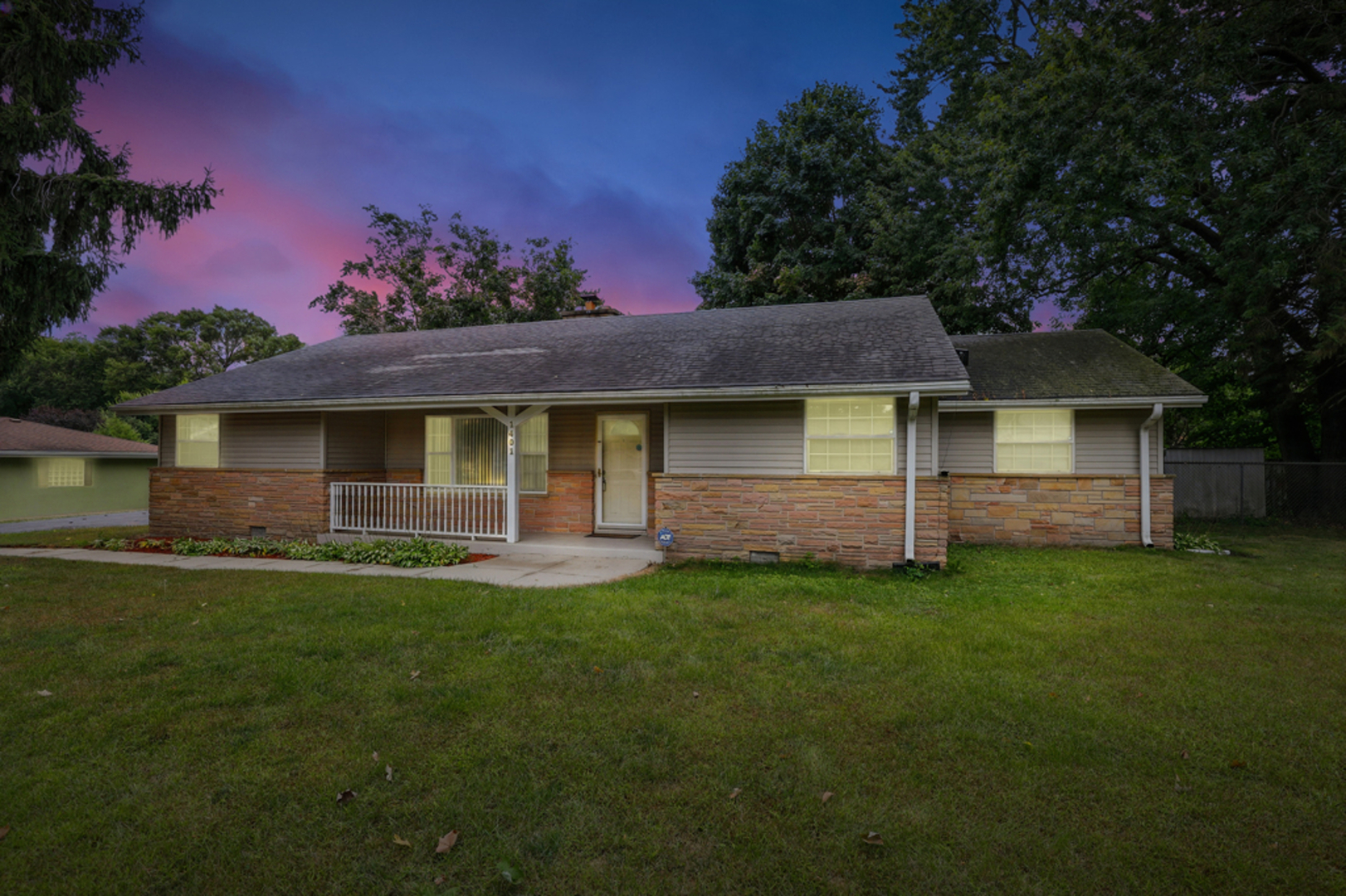 1401 20th Street Zion, IL 60099 - Photo 30 of 30 a front view of a house with a garden