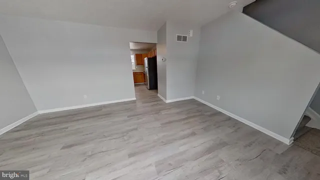 a view of empty room with windows