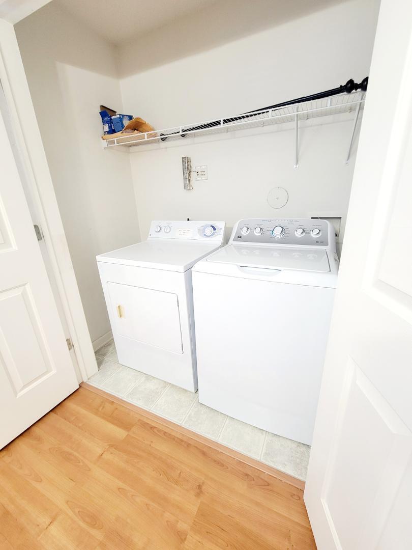 3770 Pardue Woods Place, Unit 103 Raleigh, NC 27603 - Photo 16 of 42 a utility room with dryer and washer