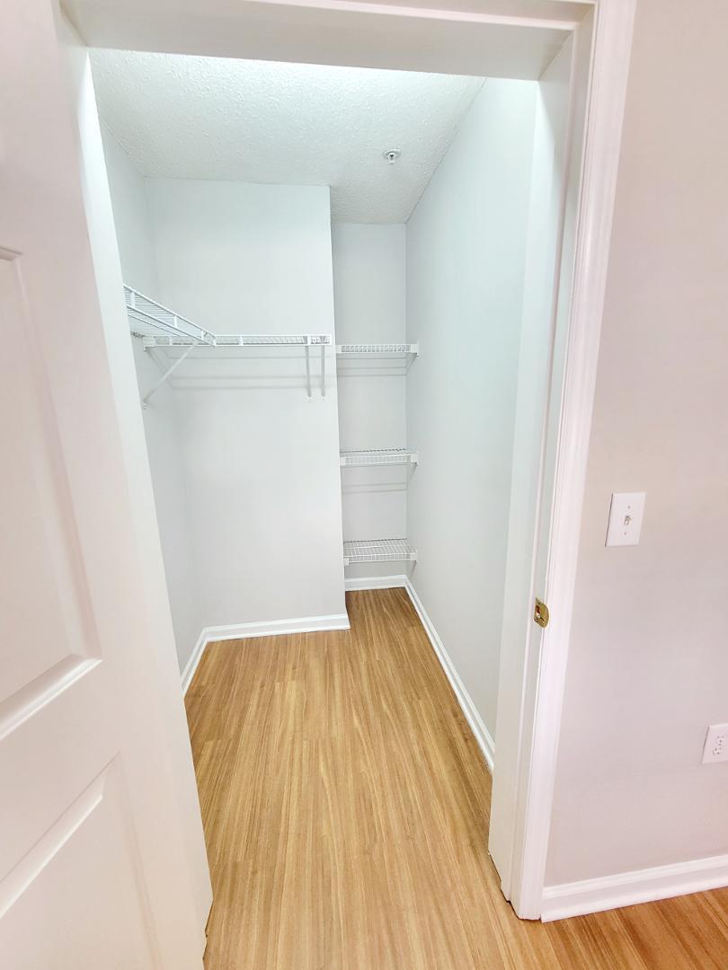 3770 Pardue Woods Place, Unit 103 Raleigh, NC 27603 - Photo 30 of 42 a view of wooden floor in a room