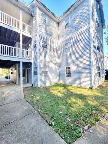 a view of a porch of a house