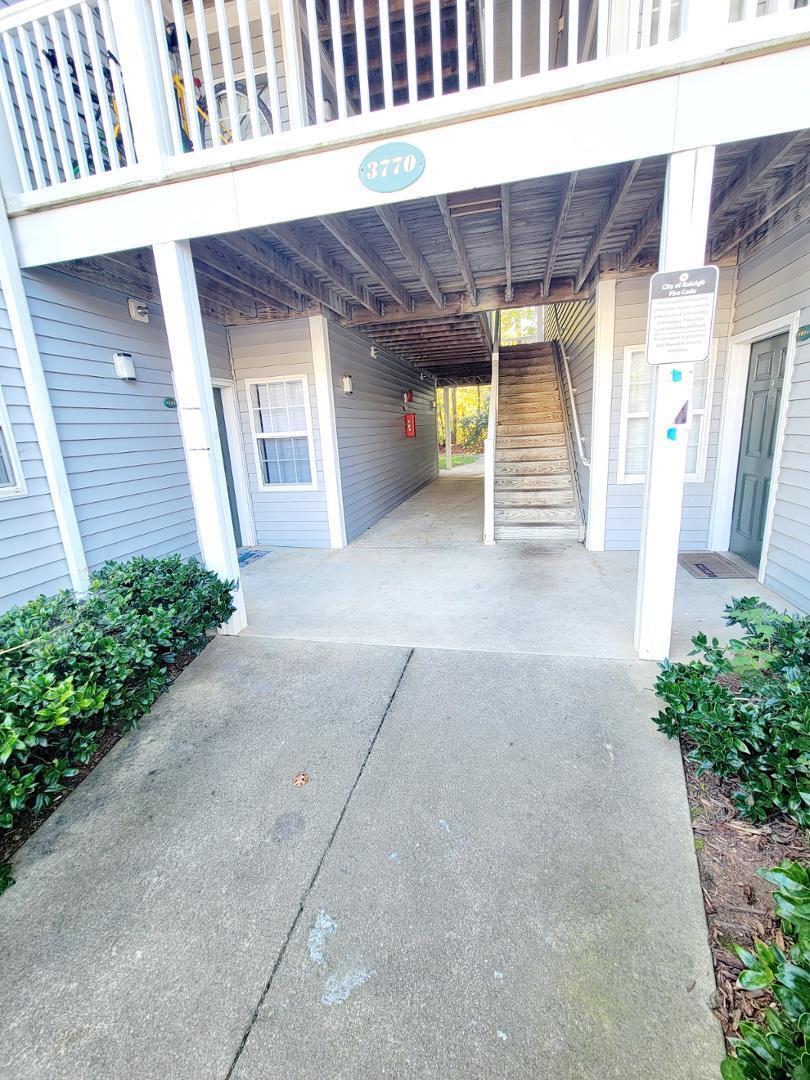3770 Pardue Woods Place, Unit 103 Raleigh, NC 27603 - Photo 41 of 42 a view of a porch of a house