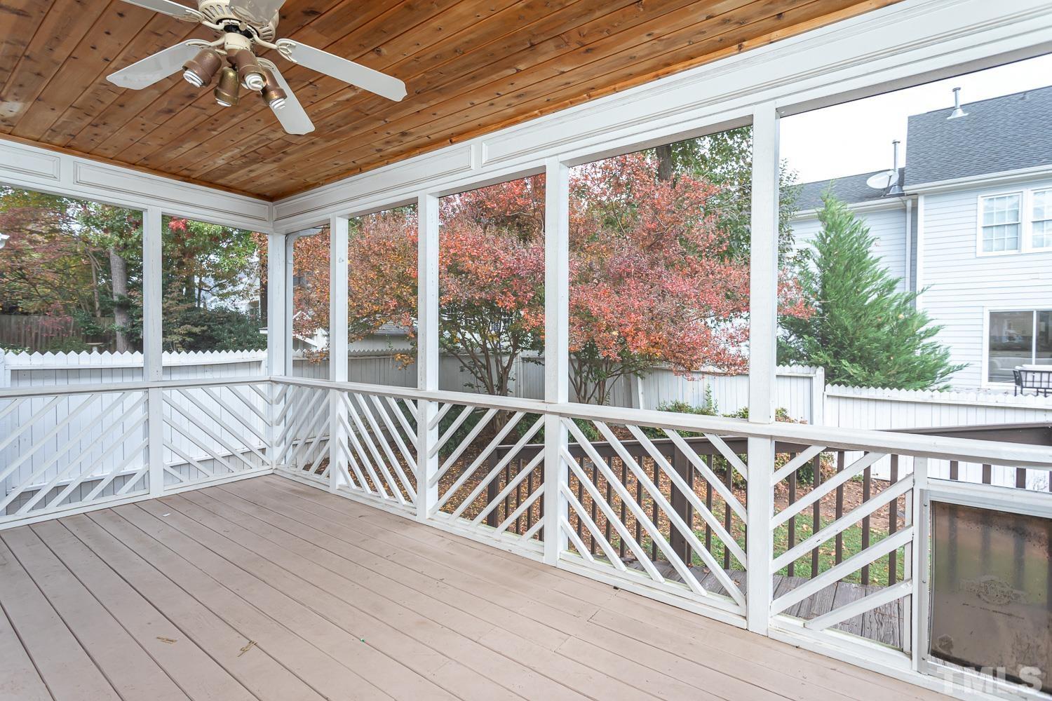 8669 Harps Mill Road Raleigh, NC 27615 - Photo 9 of 13 a view of a balcony with furniture