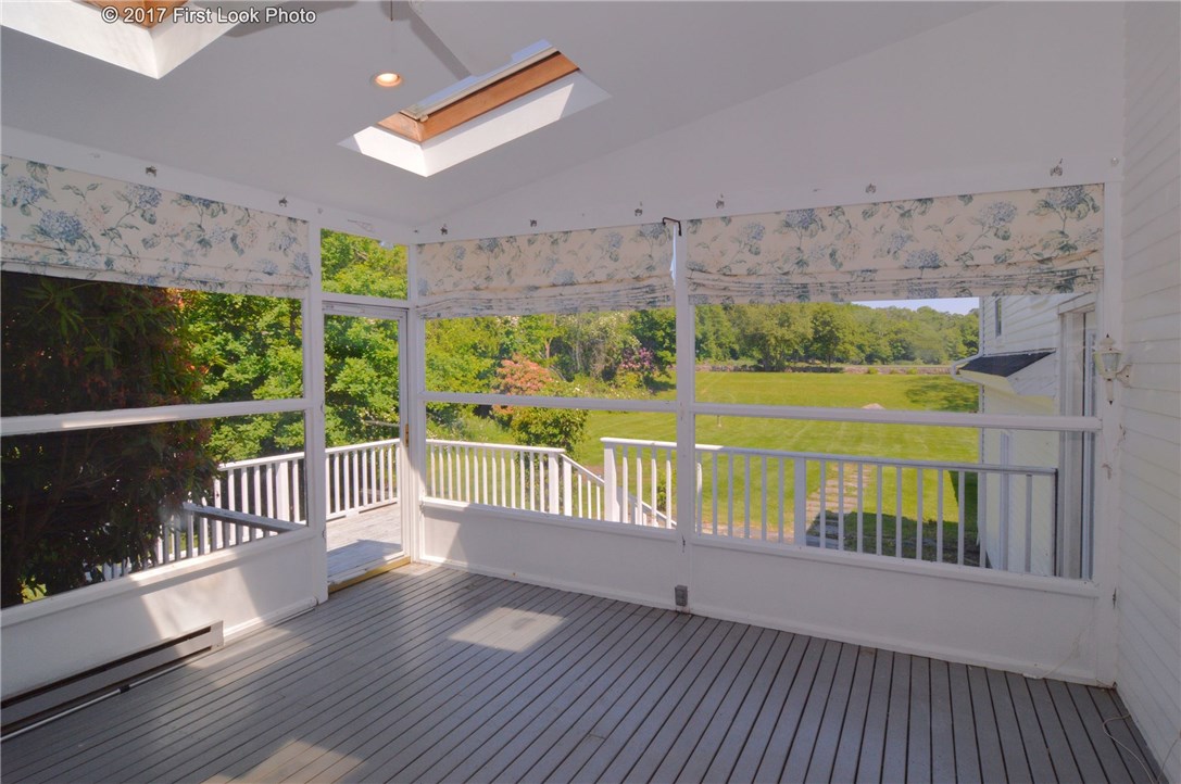 1368 Main Road Tiverton, RI 02878 - Photo 11 of 35 SOLARIUM OFF THE KITCHEN AND LIVING RM THROUGH FRENCH DOOR, VIEWS