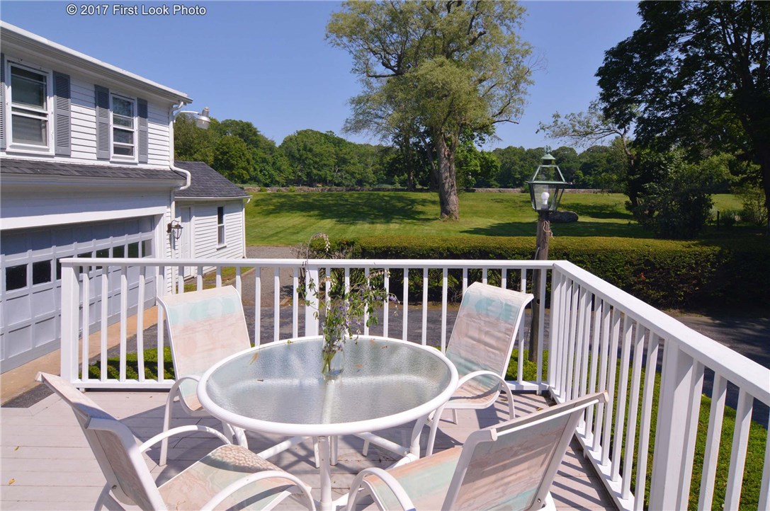 1368 Main Road Tiverton, RI 02878 - Photo 12 of 35 DECK OVERLOOKING REAR YARD AND VIEW OF POND