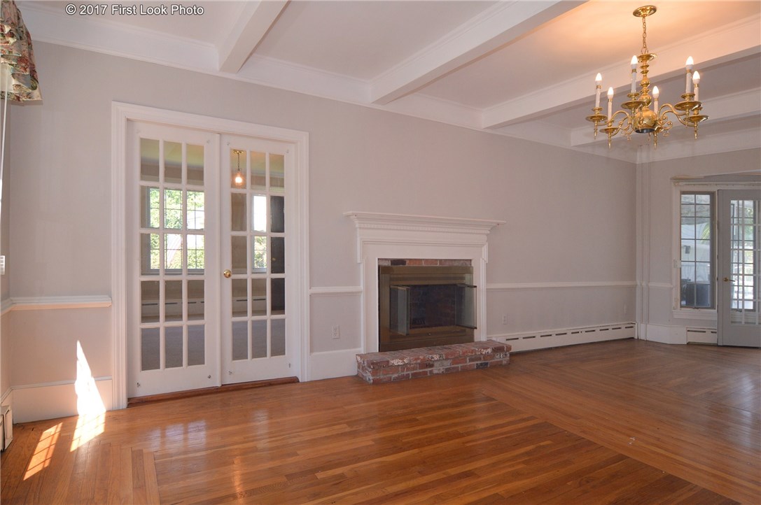 1368 Main Road Tiverton, RI 02878 - Photo 13 of 35 LIVING ROOM LOOKING INTO OFFICE AND LIBRARY