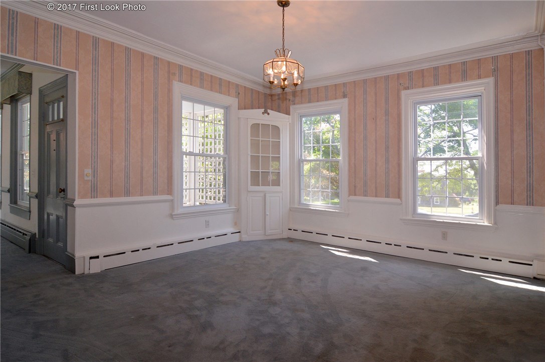 1368 Main Road Tiverton, RI 02878 - Photo 17 of 35 DINING RM IS FRONT OF THE HOUSE ON SIDE OF CENTER STAIRCASE