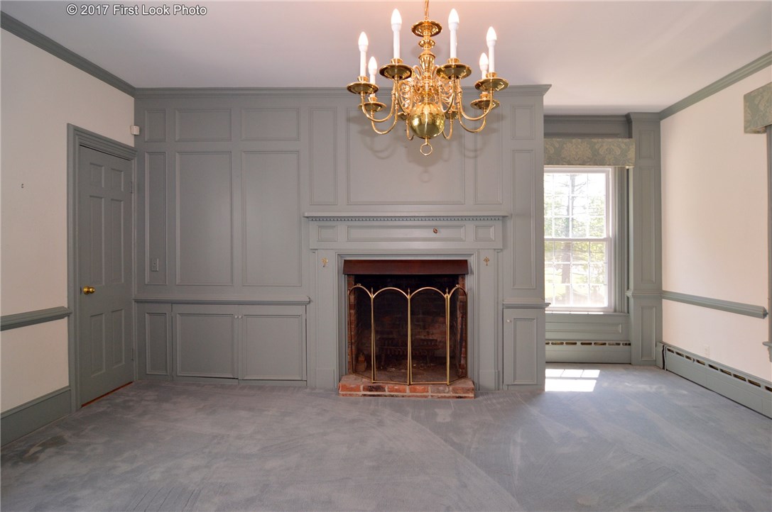 1368 Main Road Tiverton, RI 02878 - Photo 20 of 35 SECOND LIVING OR DINING RM WITH RAISED PANELS