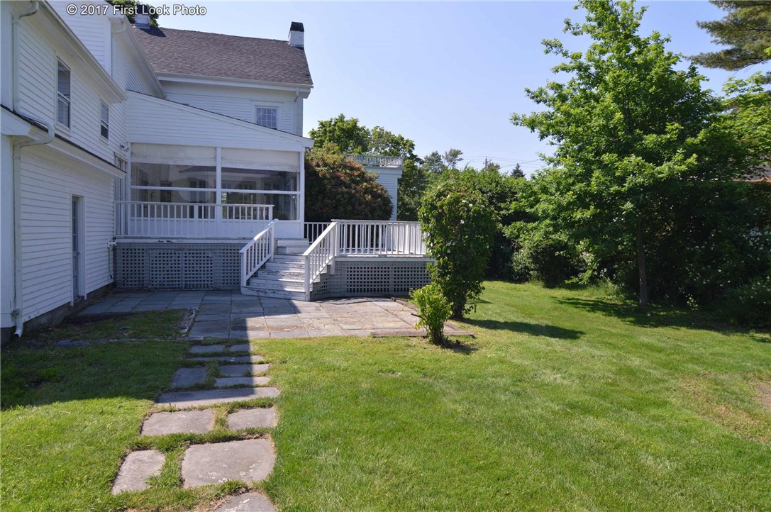 1368 Main Road Tiverton, RI 02878 - Photo 3 of 35 EXTERIOR REAR DECK OFF SOLARIUM W VIEW OF POND