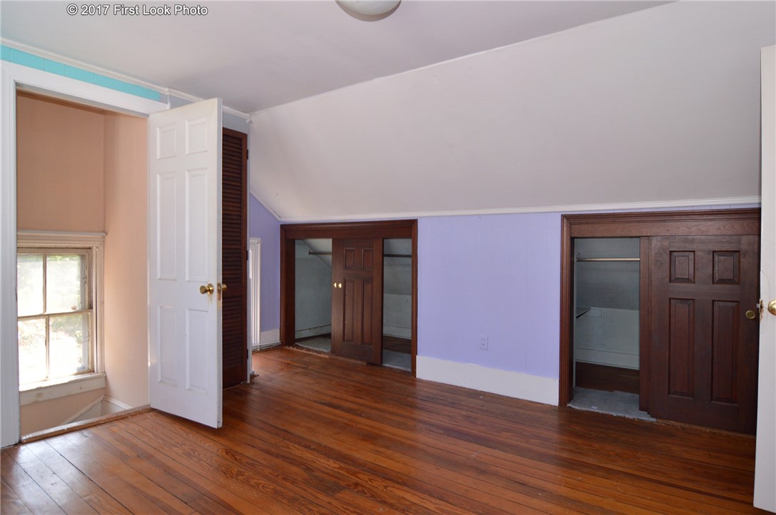 1368 Main Road Tiverton, RI 02878 - Photo 33 of 35 BEDROOM 5 WITH REAR ACCESS TO MAIN LEVEL