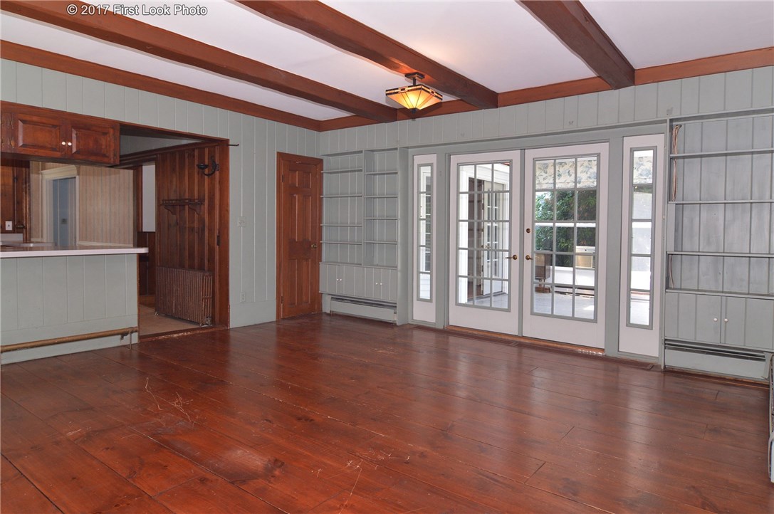 1368 Main Road Tiverton, RI 02878 - Photo 8 of 35 FAMILY RM OPENS TO THE SOLARIUM
