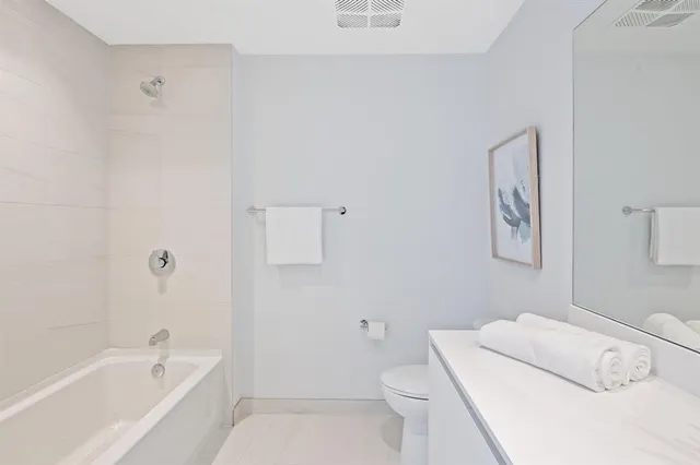 a view of a swimming pool with an outdoor seating and yard