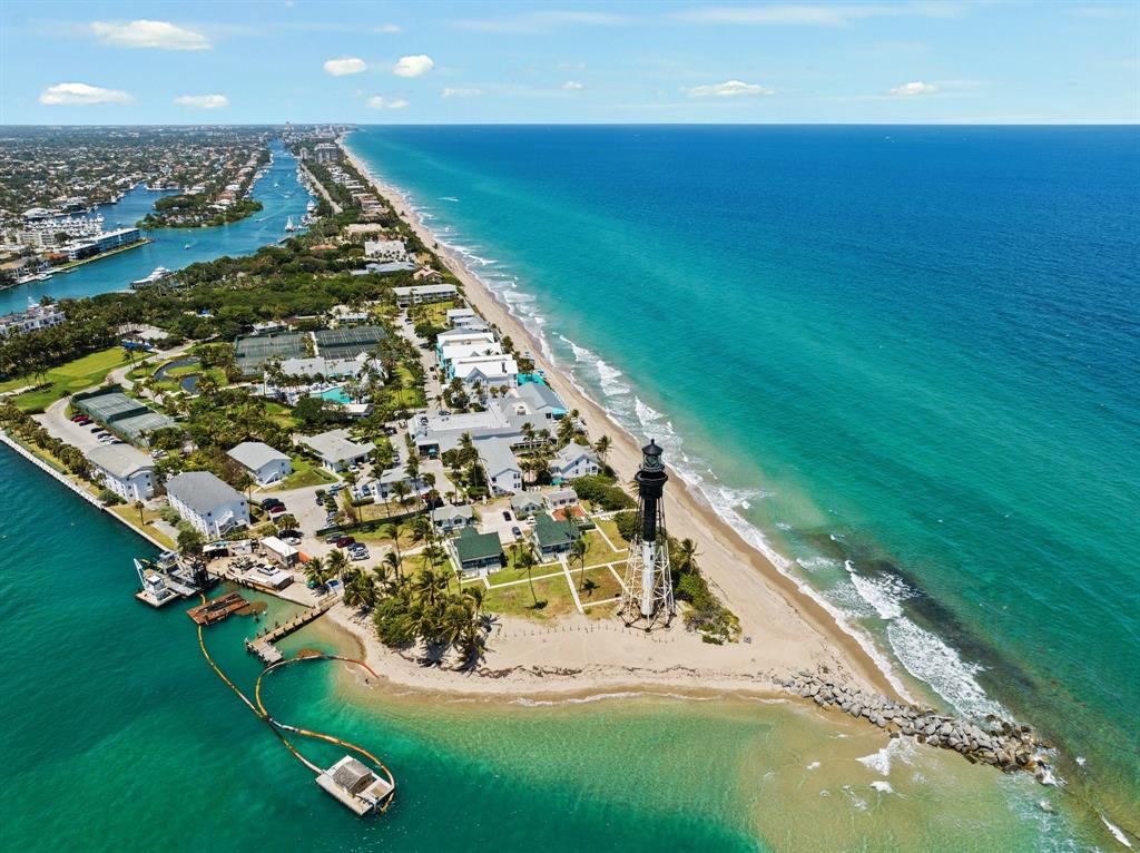 1116 North Ocean Boulevard, Unit 1606 Pompano Beach, FL 33062 - Photo 30 of 83 a view of a swimming pool with an outdoor seating and yard