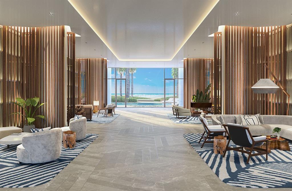 1116 North Ocean Boulevard, Unit 1606 Pompano Beach, FL 33062 - Photo 31 of 83 a living room with furniture and large windows