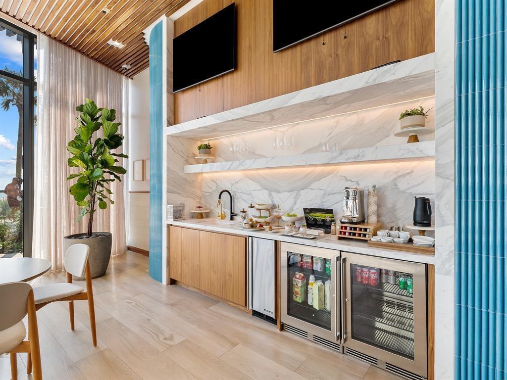 1116 North Ocean Boulevard, Unit 1606 Pompano Beach, FL 33062 - Photo 34 of 83 a kitchen with stainless steel appliances granite countertop a stove a sink and a refrigerator