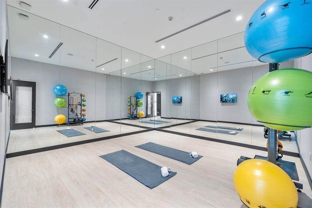 1116 North Ocean Boulevard, Unit 1606 Pompano Beach, FL 33062 - Photo 47 of 83 a view of a kitchen with a table and chairs