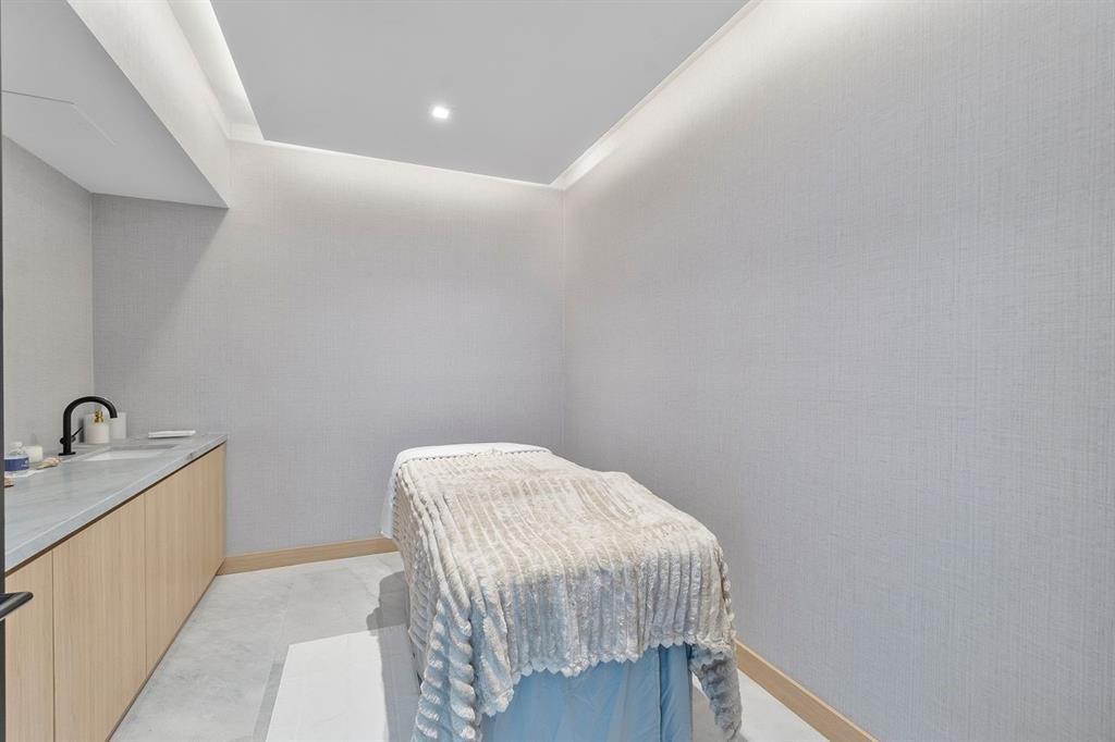 1116 North Ocean Boulevard, Unit 1606 Pompano Beach, FL 33062 - Photo 48 of 83 a room with a bed and a sink